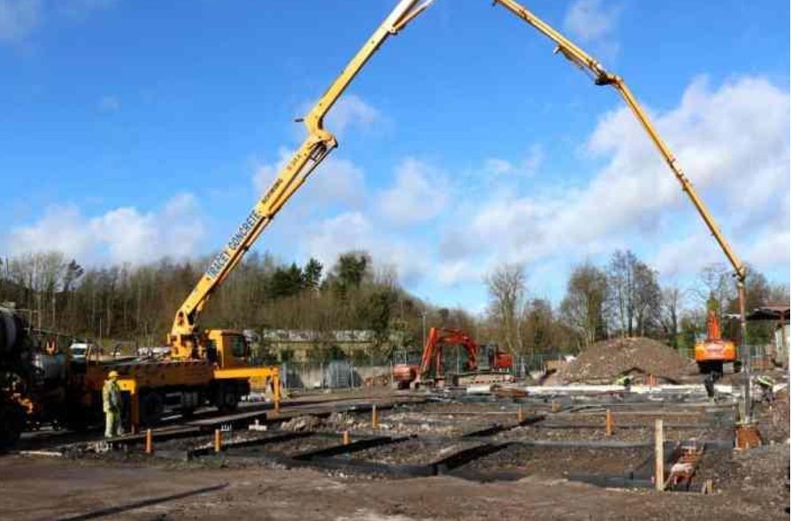 Concrete pump placing fresh concrete while maintaining workability